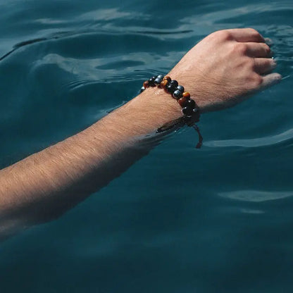 Pulseira com tripla proteção: ágata genuína olho de tigre e pedra biliar negra. O presente perfeito.